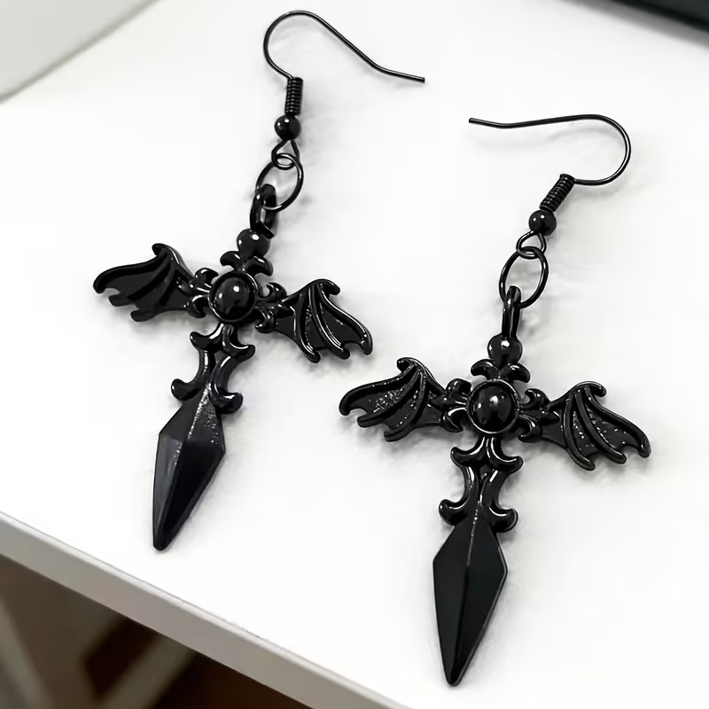 aretes cruz negra